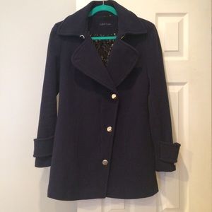 Asymmetrical navy blue peacoat