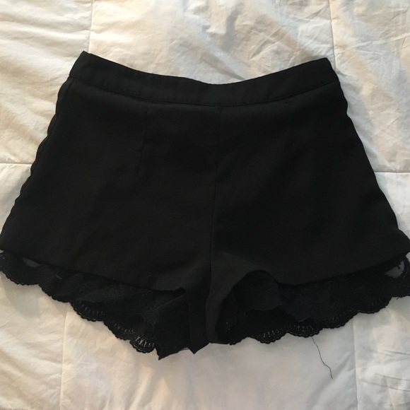 Black Highwaisted shorts with lace at the bottom