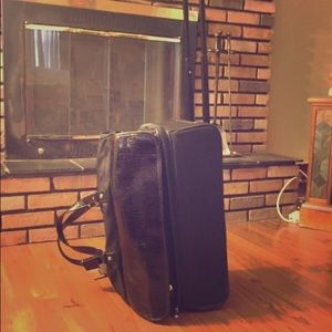 Black rolling luggage
