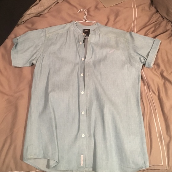 Blue button up short sleeve shirt