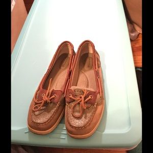 Green and tan Sperrys.