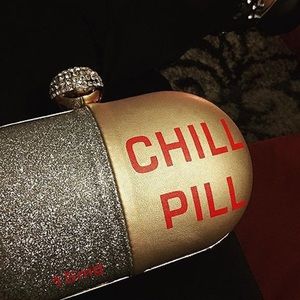 Chill pill clutch only in pink or black
