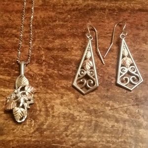 Sterling and rose gold necklace and earrings.