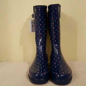 Blue rainboots with purple & green polka dots.