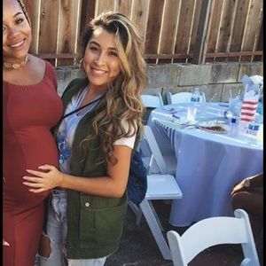 Green sleeveless jacket