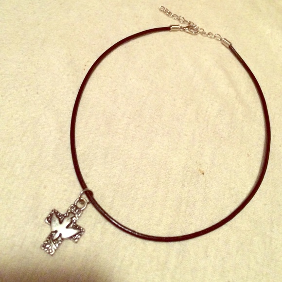 A beautiful charm & black cord choker necklace 😍