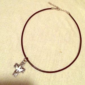 A beautiful charm & black cord choker necklace 😍