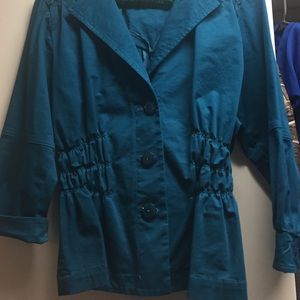 Jacket in Solid Teal color.