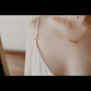 "Mama"necklace. 14k gold. Brand new