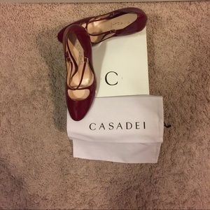 Red Patent Leather strapped heels.