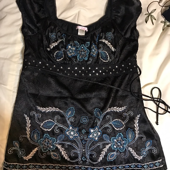 Black and turquoise top with light shimmer