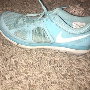 Blue women's Nike tennis shoes