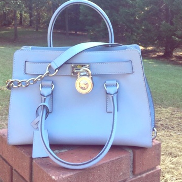 Authentic Michael Kors silver hardware beautiful