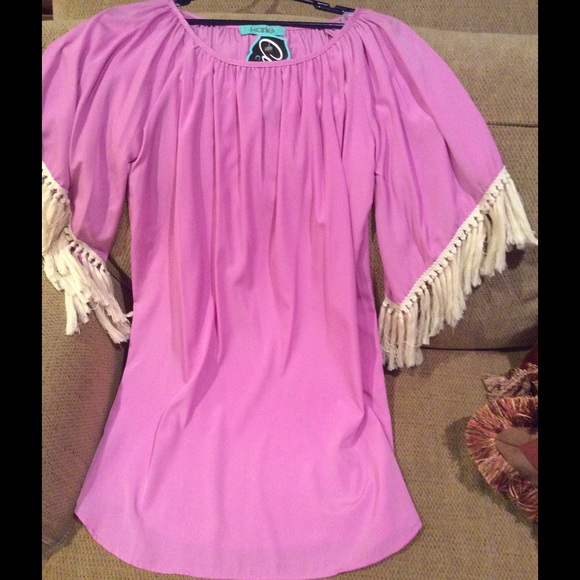 Brand new Karlie dress with fringe sleeves