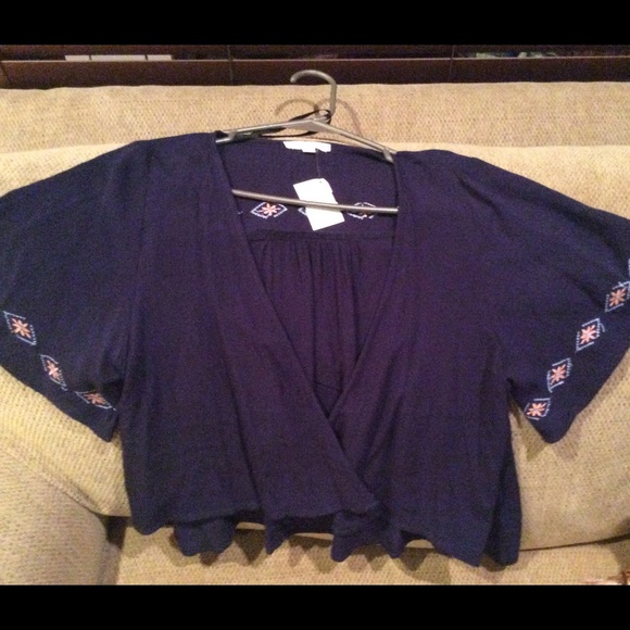 Navy blue with detail on sleeves open top