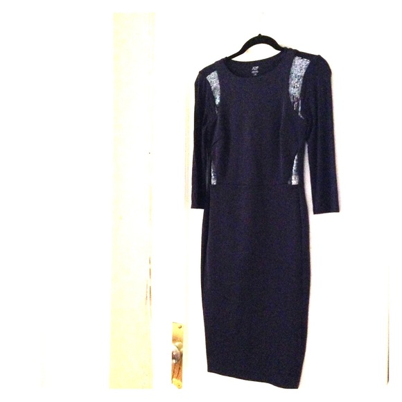 Modern navy dress with cutouts.