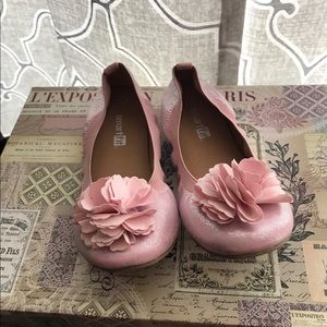 Pink flats with a flower bow