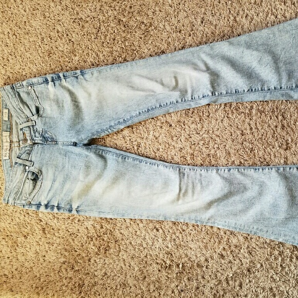 Stella light wash boot cut jeans.