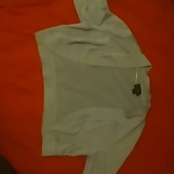 A cropped cardigan