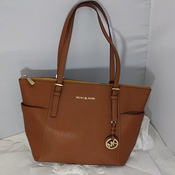 Michael Kors Handbags - Michael Kors Jet Set Saffiano EW Tote Top Zip