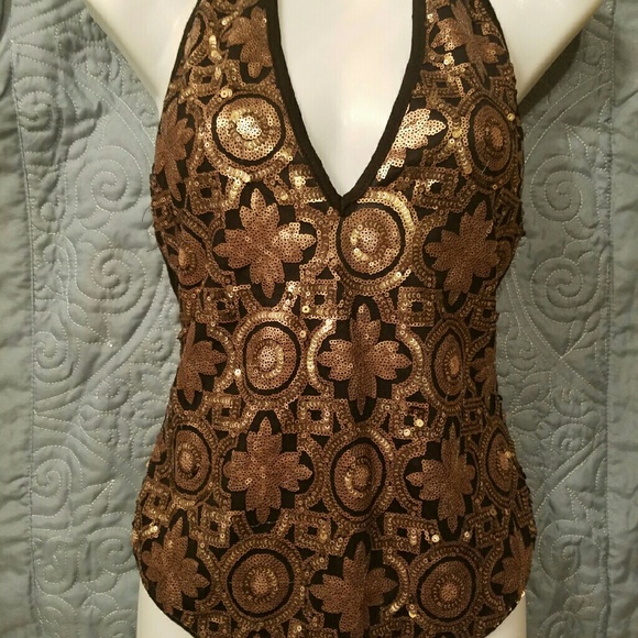 Black and gold sequined body suit