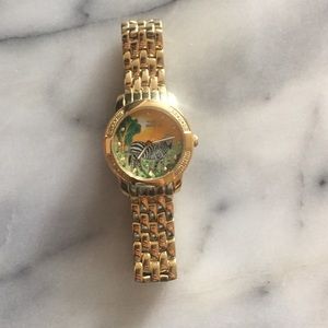 Gold Invicta watch