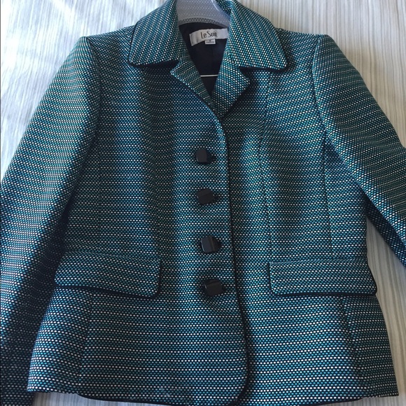 Green, black and white suit coat