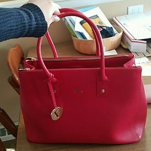 Red structured Furla bag.