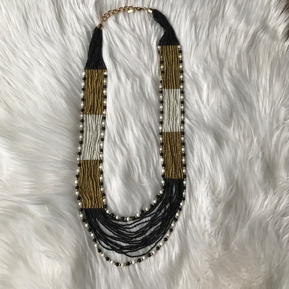 Beaded strand necklace in black white gold