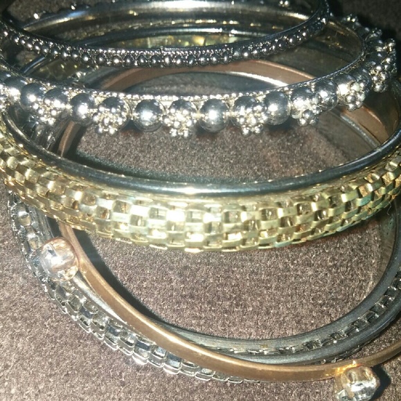 Gold and silver colored braclets