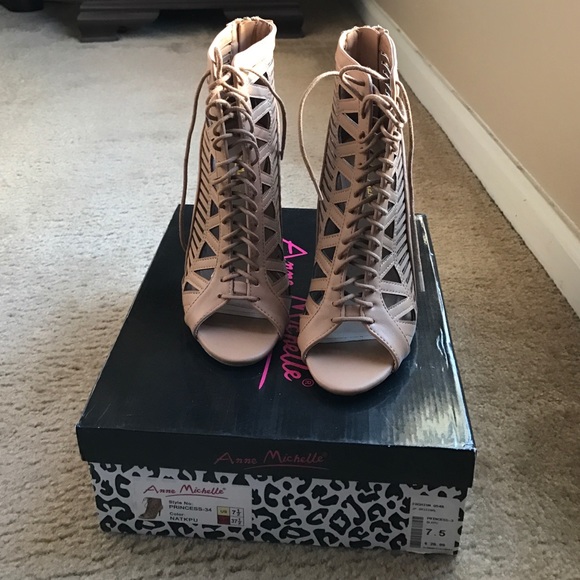 Anne Michelle peep toe cage heels.