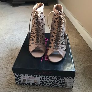 Anne Michelle peep toe cage heels.