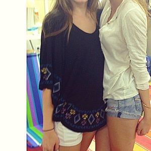 Poncho-like top with embroidery