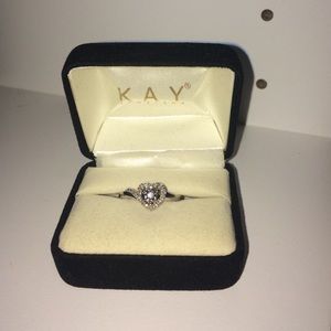 Heart shaped diamond ring.