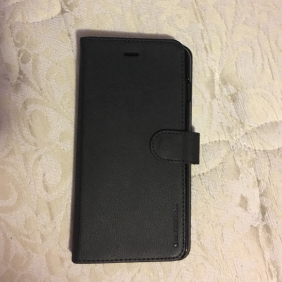 Black Iphone 6S Plus wallet case.