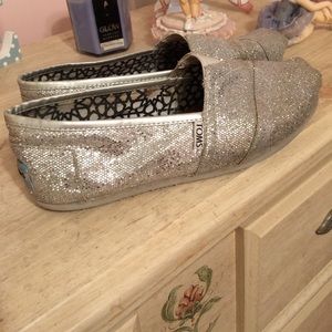 Size 8 women's silver sparkly Toms shoes