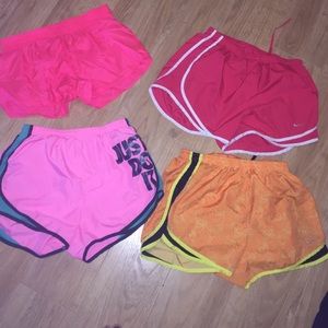 3 Nike shorts and 1 pair of soffe shorts