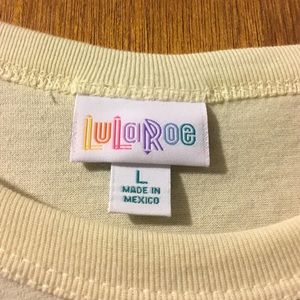 LuLaRoe Tops - NWT Ivory LulaRoe Randy w/ Gray and Black Sleeves LuLaRoe Tops - NWT Ivory LulaRoe Randy w/ Gray and Black Sleeves