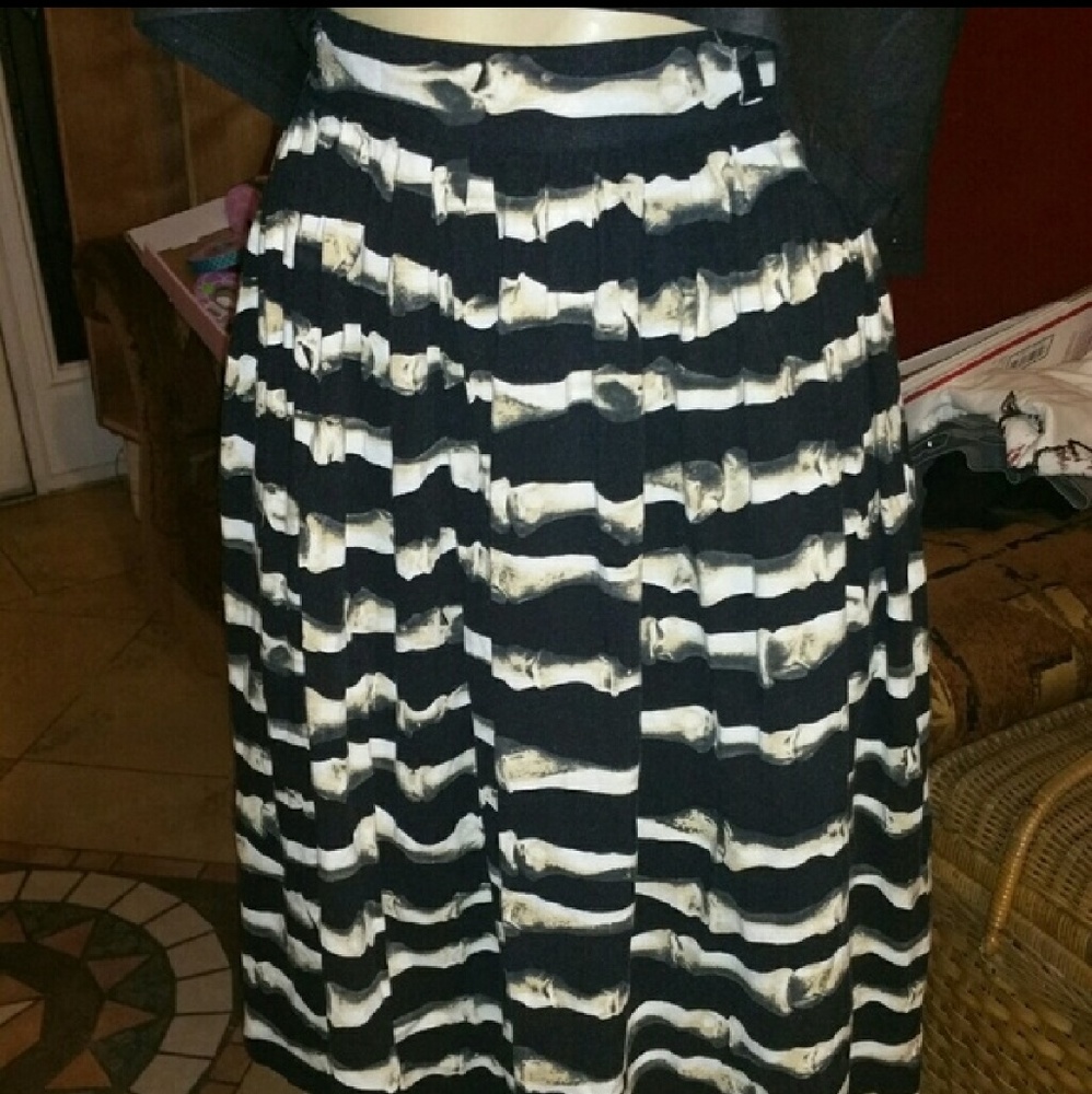 Bone Me swing skirt iron fist 💀