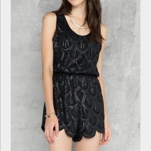 Francesca's boutique black sequin romper Medium