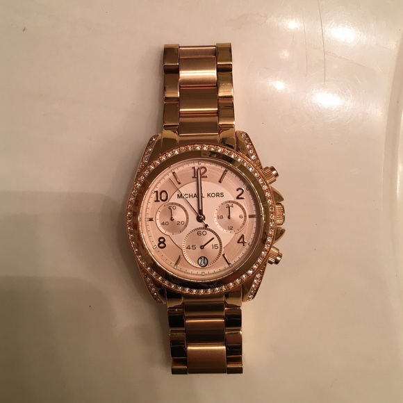 Rose gold Michael Kors watch with jeweled bezel