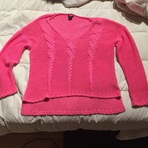 Bright pink crocheted sweater