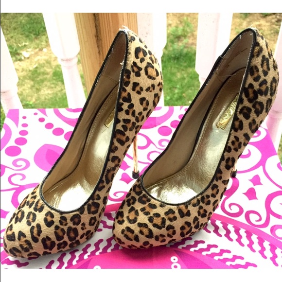 Pony hair leopard print pumps with gold heels.