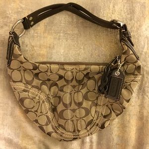Classic brown Coach hobo with leather detail