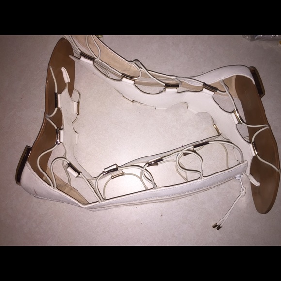 White Aldo strap-up sandals
