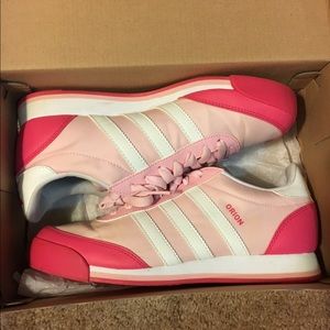 Pink and white Adidas