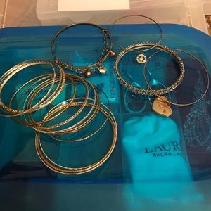 Set of silver, gold and some with charm bangles