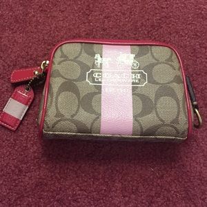 COACH small makeup case.