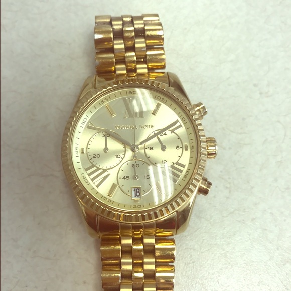 Michael Kors gold watch.