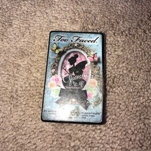 Too faced eye shadow, blush, bronzer & lip gloss.